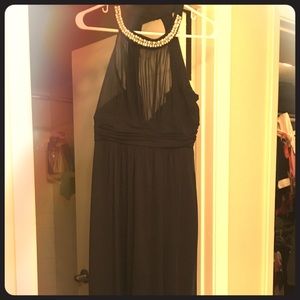 Navy blue ankle length sleeveless dress.